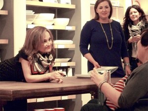 Food Network celebrity chef Giada De Laurentiis signs a copy of her new cookbook for Nisa Shinners of Renton at the Williams-Sonoma in Bellevue Square on Thursday night