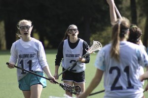 Camille Sullivan (center) hopes to help her team the playoffs in her senior season