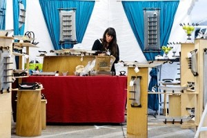 Artists set up booths in preparation of the Bellevue Arts Museum artsfair starting tomorrow at 9:30 a.m. The fair will take place in the west parking garage at Bellevue Square.