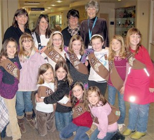 Members of the second grade Enatai Elementary School Brownie troop raised $300 from a recent cookie sale to donate to Seattle's Children's Hospital. Front row