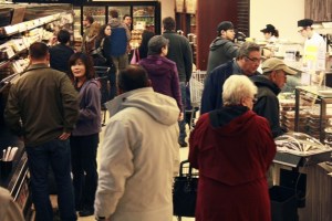 Customers flooded the newly opened Your Local Market grocery store Friday
