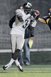 Skyline WR Kasen Williams (3) hauls in a touchdown reception against Bellevue at Memorial Stadium in Seattle on Saturday. The Spartans won 28-21.