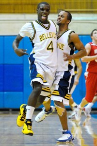 Wolverine forward Evian Richard (4) celebrates a three point basket with less than a second left in the first half against Mount Si in the KingCo 3A league title game on Friday.