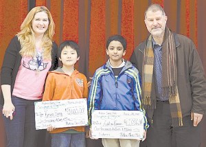 From left: Medina Chess Club chair Jill Keto; Kevin Song