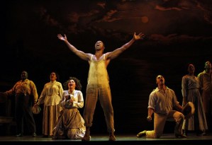 Jim (Rodney Hicks) and Ensemble.