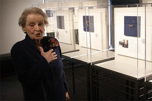 Former Secretary of State Madeleine Albright said wearing pins started out as a response to criticism from Saddam Hussein.