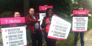 Protestors outside the T-Mobile shareholders meeting decry what they claim as the company's unethical practices.