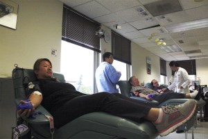 A Bellevue resident donates blood at Bloodworks Northwest after the duck boat crash last September.