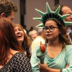 An attendee at the state democrats election night party dressed as Lady Liberty looks displeased as the national election results pour in (Allison DeAngelis/staff photo).