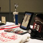Deanna Carr&rsquo;s firefighter helmet sits on a table with some other momentos from her life (Allison DeAngelis/staff photo).