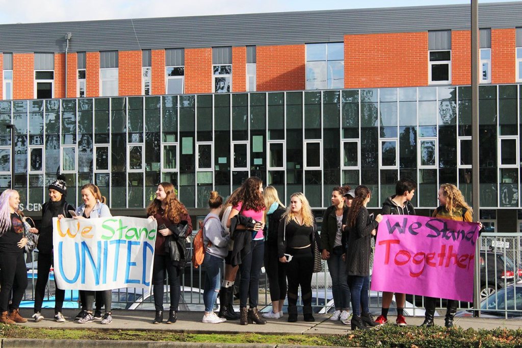 Sammamish student Ellie Adams said that she has seen the impact of the election nationally and locally. &ldquo;I didn&rsquo;t come to school on Wednesday because I was so upset about the election. Mostly about the vice president [Pence], who is in favor of gay conversion therapy. I&rsquo;m pansexual. We&rsquo;re here today to support one another,&rdquo; she said (Allison DeAngelis/staff photo).