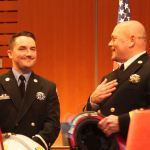 Deputy Chief Todd Dickerboom, right, congratulates newly promoted Lieutenant Luke Steere, left (Allison DeAngelis/staff photo).