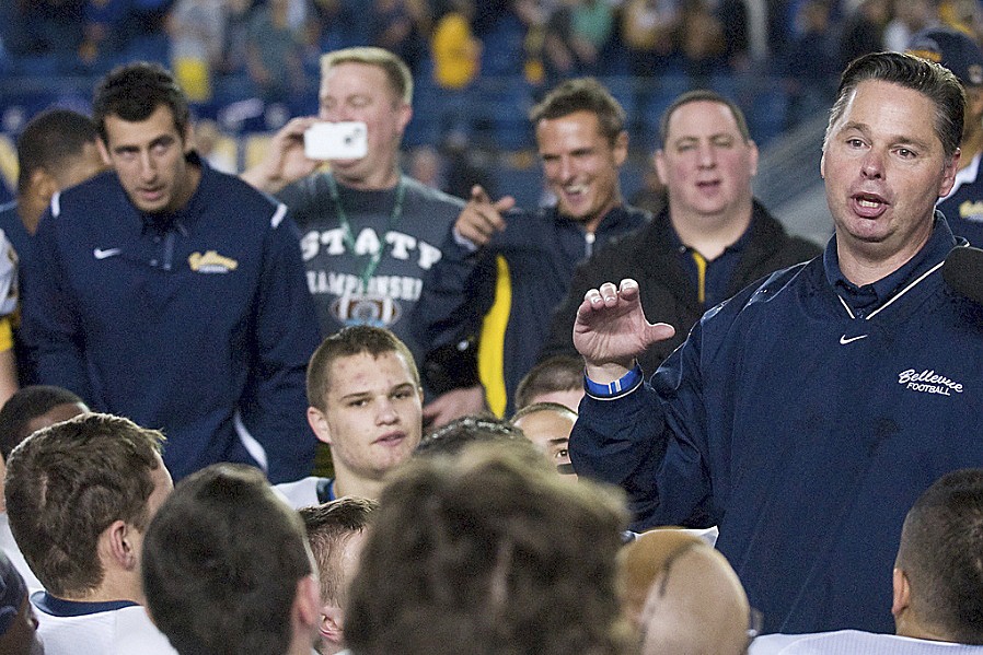 Former Bellevue Wolverines football head coach Butch Goncharoff speaks to Bellevue players during his 16-season stint as head coach. Goncharoff was hired as the Cedar Park Christian head football coach on Jan. 23.                                Reporter file photo