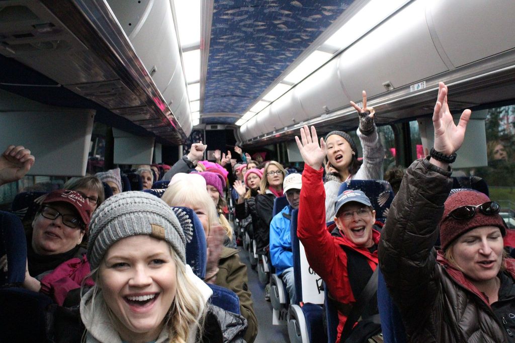 Eastside residents cheer as their bus leaves South Bellevue (Allison DeAngelis/staff photo).