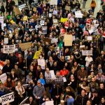 Hundreds protest the new federal immigration ban at SeaTac Airport over the weekend (Alex Garland/Seattle Weekly).