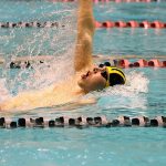 Bellevue&rsquo;s Thomas Eggenberger competes in the 100 back. Eggenberger placed second, finishing in 51 seconds flat (Joe Livarchik/staff photo).