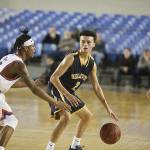 Photo courtesy of Don Borin/Stop Action Photography                                Bellevue Wolverines sophomore guard Jalen Love, right, is guarded by Rainier Beach point guard Kahlil Shabazz in the first round of the Class 3A state boys basketball tournament. Rainier Beach defeated Bellevue 69-38 in the contest on March 1 at the Tacoma Dome.