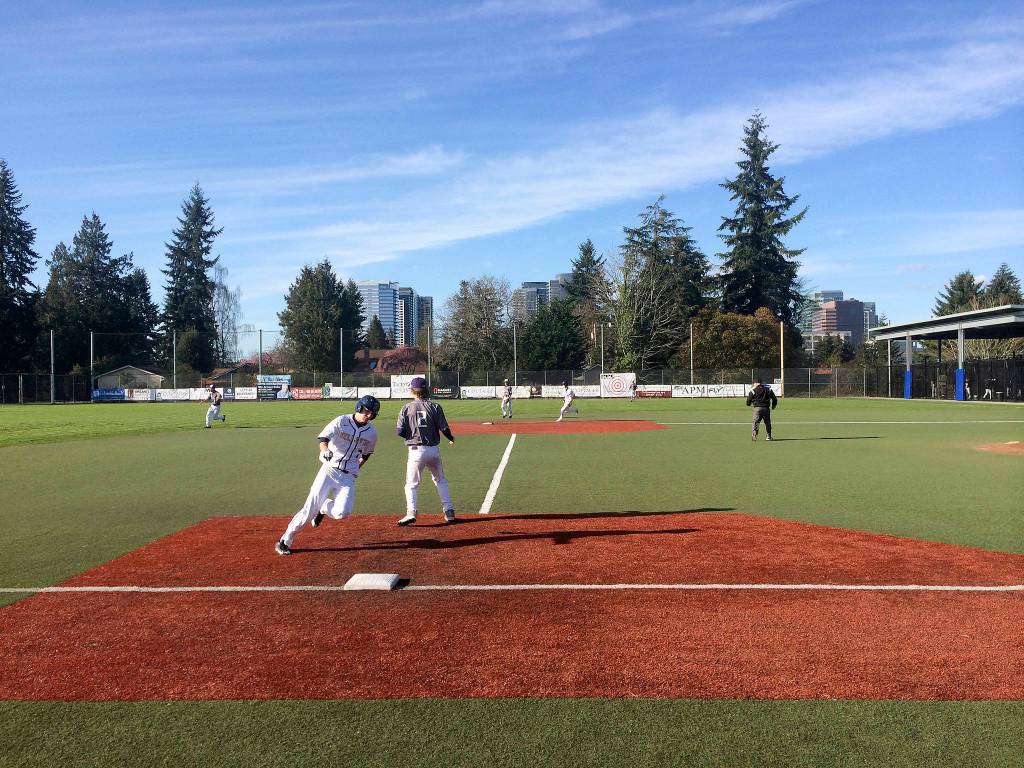 Shaun Scott, staff photo                                Bellevue Wolverines player Andrew Bennett, who was a courtesy runner for starting pitcher Jack Enger, rounds third base before scoring Bellevue&rsquo;s second run of the game in the bottom of the third inning. The Wolverines defeated the Lake Washington Kangaroos 3-2 on April 3 at Bellevue High School.