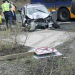 The aftermath of a car crash Thursday afternoon. The driver of the silver vehicle cross a lane of traffic and struck a King County Metro bus stopped at a light. Ryan Murray/staff photo