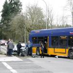 The aftermath of a car crash Thursday afternoon. The driver of the silver vehicle cross a lane of traffic and struck a King County Metro bus stopped at a light. Ryan Murray/staff photo