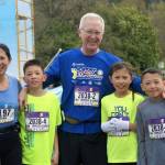 Bellevue running family blooms at Woodland marathon
