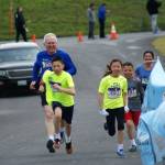 Bellevue running family blooms at Woodland marathon