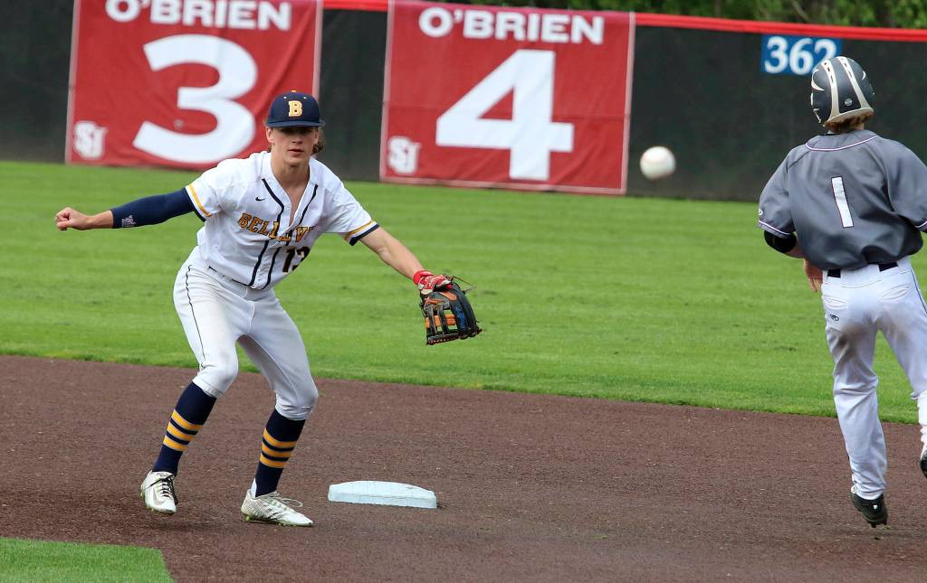 Andy Nystrom, Reporter Newspapers                                Bellevue Wolverines infielder Connor Cirillo turns a double play in a KingCo playoff game on May 5. The Lake Washington Kangaroos earned a comeback 6-5 win against the Bellevue Wolverines in a loser-out playoff game on May 9 at Bannerwood Park in Bellevue.