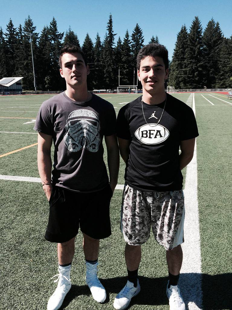 Shaun Scott, staff photo                                Interlake Saints 2017 graduates Duncan Varela, left, and Naoki Harmer, right, will play in the East vs. West all-state football game on June 30 in Moses Lake.