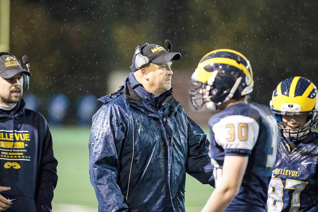 Photo courtesy of Jennifer Landes                                Bellevue Wolverines head football coach Mark Landes, center, talks to his players during a contest during the 2016 season.