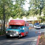 A Seattle Humane van filled with dogs drives up to drop them off. Raechel Dawson/staff photo