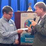 Bellevue Breakfast Rotary Club donates $5,000 to Special Olympics Washington