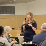Bellevue School Board President Christine Chew presents her group&rsquo;s feedback at the community forum. Raechel Dawson/staff photo