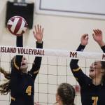 Photo courtesy of Don Borin/Stop Action Photography                                The Bellevue Wolverines captured second place at the KingCo 3A volleyball tournament on Oct. 28. The Wolverines defeated Redmond 3-0 in the first round but lost 3-1 to the Mercer Island Islanders in the championship match. Bellevue sophomore Jessica Buxton, left, and senior Callie Weber, right, leap into the air on a play against the Mercer Island Islanders. Bellevue will compete in the Class 3A Sea-King volleyball tournament from Nov. 1 through Nov. 4.