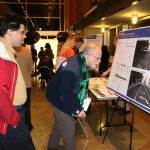 Members of the Bellevue community look at plans for the proposed Demonstration Bikeway Project in Downtown Bellevue at a open house at City Hall last week. Raechel Dawson/staff photo