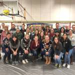 Employees of Bellevue-based VitalSource spent their work day on Dec. 6 helping the nonprofit organization Christmas House, which provides an opportunity for low-income parents to select free holiday gifts for their children. Photo courtesy of Jason Radach/VitalSource