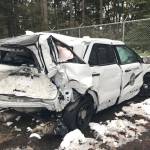A distracted driver struck Washington State Patrol Trooper Michael Patocs vehicle while he was helping a disabled motorist blocking a lane of eastbound Interstate 90 on Tuesday night in Bellevue. Photo courtesy of the Washington State Patrol