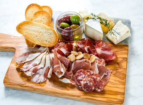 Crosta E Vino: American craft pizza + artisanal cheeses & salumi boards + tap wine bar Highlights: Salumi artisan cured meats, including: Prosciutto Americano, lamb prosciutto, guanciale | Rotating selection of toasts with bread from Grand Central Bakery| Oven baked pizzas pay homage to Italian artisans| Local and American handmade cheeses | 30 red and white wines served from specialty barrel taps