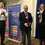 Tom Leonidas and Adam Mihlstin with Bellevue Breakfast Rotary Club members present the check to Cori Walters, the executive director of the Issaquah Food & Clothing Bank. Photo courtesy of Bellevue Breakfast Rotary Club