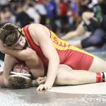 Photo courtesy of Don Borin/Stop Action Photography                                Newport 285-pound senior Charlie Baumann pins Emerald Ridge sophomore Jonah Mains in the first round of the Mat Classic Class 4A 285-pound tournament on Feb. 16. Baumann caught Mains in one of his favorite moves, the head and arm.