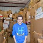 Tyler Zangaglia, one of the founders of HopeFest, at their storage unit filled with supplies for the festival on March 3. Alize Asplund/UW News Lab