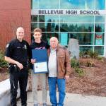 From left, Bellevue Police School Resource Officer Jeff Borsheim, Daniel Tyshler, who was recognized by the California Highway Patrol for saving the life of his grandfather, and Boris Govzman, Daniels grandfather. Photo courtesy of Bellevue Police Department