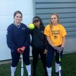 ​Shaun Scott, staff photo                                Mary Catherine Tolbert, Kama Boswell and Montana Jones are the team captains for the Bellevue Wolverines softball team.