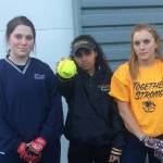 ​Shaun Scott, staff photo                                Mary Catherine Tolbert, Kama Boswell and Montana Jones are the team captains for the Bellevue Wolverines softball team.
