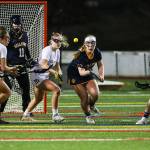 Photo courtesy of Rick Edelman/Rick Edelman Photography                                The Bellevue Wolverines girls lacrosse team lost 16-3 to the Mercer Island Islanders on March 21. Bellevue players Kimberly Nickerson, Abby Parrish and Lily Weingaertner each recorded a goal apiece in the loss. The Wolverines dropped to 2-1 overall with the loss while Mercer Island improved their overall record to 4-0.