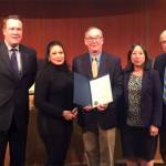 King County Sexual Assault Resource Center board member Diana Schuetz accepts the proclamation for Sexual Assault Awareness Month from the Bellevue City Council. Photo via Twitter
