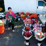 Whats a farmers market without flowers? Bellevue Farmers Market vendor Lee Lor & Garden sells beautiful flowers throughout the season. Photo courtesy of Bellevue Farmers Market