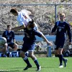Photo courtesy of Rick Edelman/Rick Edelman Photography                                Interlake midfielder Mason Sainsbury-Carter, center, tries to shield the ball from ODea midfielder Charlie Hayward in the first half of play.
