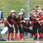 Photo courtesy of Dale Garvey                                Newport players mob Ariana Arnone at the plate after she connected on two-run home-run in the top of the second inning against the Woodinville Falcons in a winner-to-state, loser-out district playoff game on May 17 in Kenmore. Newport defeated Woodinville 9-1 in the contest.