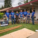 Volunteers build access ramps for locals
