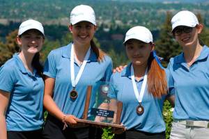 The Interlake Saints girls golf team earned second place at the Class 3A state golf tournament on May 23 at Indian Canyon Golf Course in Spokane.                                The Saints, who compiled 90 team points, finished just 1.5 points behind first place Bellevue (91.5 team points). Interlakes Samantha Na captured fifth place overall individually with a total of 153 strokes at the two-day tournament. Katie Kester registered a sixth place finish with 154 strokes. Bronte Polette finished in 21st place overall individually as well.                                Photo courtesy of Douglas Calvert